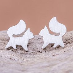 Strutting with poise two charming foxes are crafted of sterling silver in this pair of stud earrings from Thailand. Jantana designs the earrings giving each fox a brushed-satin finish that gleams in the light. Elephant Earrings Studs, Fox Earrings, Elephant Pendant Necklace, Contemporary Jewelry Design, Silver Elephants, Jewelry Workshop, Silver Jewellery Sets, Sterling Silver Stud Earrings, Silver Fox