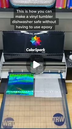 an image of a machine that is cutting paper with colorpark logo on the screen