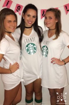 three girls in matching starbucks shirts posing for the camera