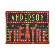 the anderson family movie theatre sign is shown in red and yellow lights, with words on it