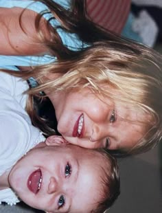 two young children laying next to each other