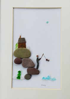 a white frame with some rocks and a man holding a golf club in it's hand