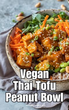 a bowl filled with meat and veggies on top of rice next to nuts