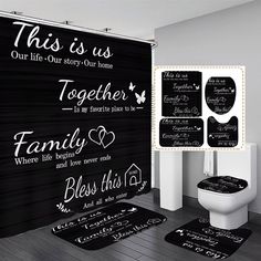 this is an image of a bathroom with black and white decor