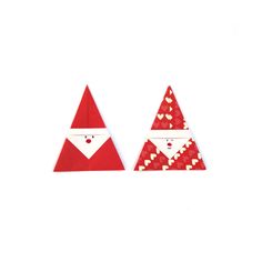 two red and white triangles with hearts on them