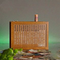 a wooden radio sitting on top of a table