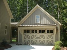 a house that has a garage in front of it