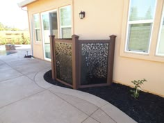 an outside view of a house with a gate