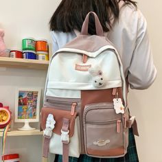 SPECIFICATIONSTechnics: JacquardStyle: FashionSize: length 30cm,Width 13cm,Height 40cmRain Cover: NoPattern Type: PatchworkOrigin: CN(Origin)Model Number: F81303566MMain Material: nylonLining Material: polyesterItem Type: BackpacksInterior: Computer InterlayerInterior: Cell Phone PocketHandle/Strap Type: Soft HandleGender: WOMENFeature 9: Nylon backpackFeature 8: fashion backpackFeature 7: school bags for teenage girlsFeature 4: student backpackFeature 31: rabbit school bagFeature 30: rabbit bac Harajuku Style Pink Backpack For Daily Use, Harajuku Style Pink Backpack For School, Harajuku Style White Backpack For Travel, Harajuku Style White Travel Backpack, White Harajuku Style Backpack For Travel, Kawaii Large Capacity Pink Backpack, Preppy Pink Backpack For School, Preppy Pink Standard Backpack, Pink Preppy Backpack For School