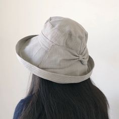 Introducing our Chic Wide Brim Sun Hat, crafted from a premium blend of cotton and linen. This stylish hat offers excellent sun protection while maintaining a sophisticated look, perfect for any outdoor activity. Material: High-quality 100% cotton for breathability and durability. Design: Waist pleats add texture and style, enhancing the overall feel of the hat. Adjustable Fit: Equipped with a drawstring inside the hat band, ensuring a perfect fit without worrying about hat size. Brim and Depth: Adjustable Handwoven Wide Brim Bucket Hat, Khaki Cotton Wide Brim Bucket Hat, Adjustable Brimmed Khaki Bucket Hat, Wide Brim Bucket Hat, One Size, Casual Wide-brim Adjustable Bucket Hat, Leather Beret, Bucket Hat Women, Knit Beret, Hat Beret