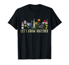 a black t - shirt that says let's grow together with flowers on it