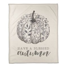 a kitchen towel with an image of a pumpkin on it that says, have a blessed autumn