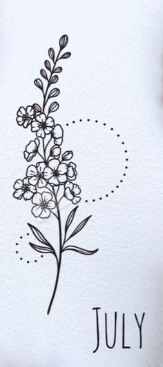 a flower with the word july written in black ink on white paper next to it