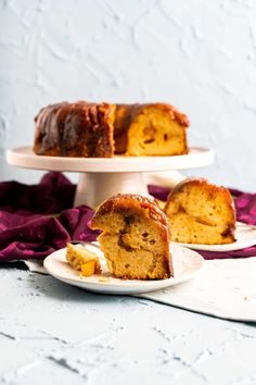 a bundt cake on a plate with one slice cut out