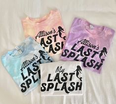 three t - shirts with different designs on them sitting on a white bed spreader