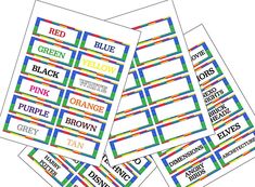 four different colored stickers with the words red, yellow, orange and green on them