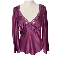 Banana Republic Gorgeous Womens Deep V-Neck Lace Silk Top Blouse, Bell 3/4 Long Sleeve And Empire Waist In Dark Purple Color - Lace Trimming V-Neckline. Excellent Condition/ Never Worn 100% Silk. Smooth Shiny Satin Lightweight Fabric. Side Hidden Inseam Zipper. Size M ( Bust (Pit-Pit) 18” Across Unstretched With No Room To Stretch, Length: 23”. Perfect Piece As Going Out Tops, Evening Tops, Party Tops Or Summer Tops. Color: Purple/Brown ( Eggplant Purple) Deep V Neck Blouse, Purple Prints, Silk Tops Blouses, Dark Purple Color, Pixie Hollow, Lavender Aesthetic, Evening Tops, Lace Silk, Eggplant Purple