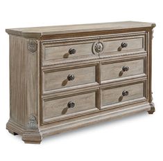 an antique style dresser with drawers and knobs on the top, in grey wood