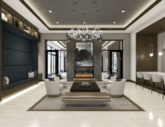 a large living room with white furniture and chandelier