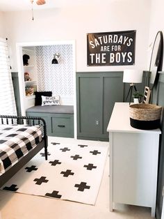 a bedroom with a black and white checkered rug