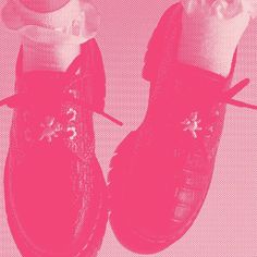 two pairs of shoes with bows on them are shown against a pink background and there is also a pair of white socks in the foreground