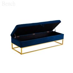 a blue velvet storage box with gold frame and handles on an isolated white background for display