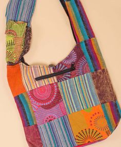 multicolored patchwork purse hanging on wall