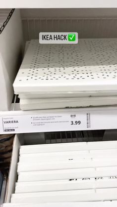 an ikea hack sign is displayed on the shelf in a store's closet