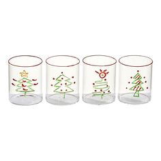 four glasses with christmas trees painted on them