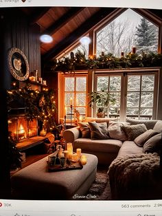 a living room filled with furniture and a fire place in front of a window covered in christmas lights