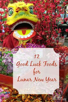 a dragon statue with the words good luck foods for lunar new year