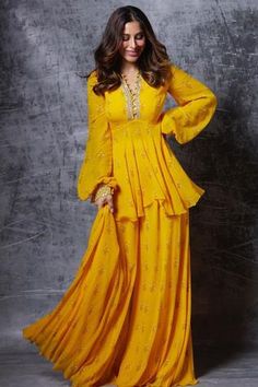 Shop for Sana Barreja Yellow Georgette Sara Floral Print Peplum Top And Sharara Set for Women Online at Aza Fashions Printed Sharara, Haldi Dress, Sharara Designs, Haldi Outfits, Sharara Pants, Haldi Outfit, Function Dresses, Tandoori Masala, Salwar Kamiz