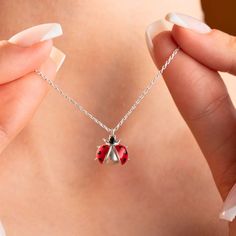 Sterling Silver Ladybug Necklace 🐞✨ This delightful Ladybug Necklace represents good luck, love, and joy. Crafted from 925 sterling silver, it makes the perfect gift or an elegant daily accessory, adding a whimsical charm to any outfit. Metal Used: 925 Sterling Silver 🪙 Weight: 2.00 g ⚖️ Figure Width: 1.15 cm (0.45") Figure Length: 1.20 cm (0.47") Chain Length: 42 cm (16.54") 📏 Color Options: Gold, White Gold, Rose Gold 🌟🌸 Care Instructions: Avoid contact with perfume, alcohol, lotion, blea Minimalist Gold Necklace, Ladybug Necklace, Jewelry Kids, Cute Ladybug, Luck Necklace, Principal Gifts, Minimalist Necklace Gold, Godfather Gifts, Big Sister Gifts