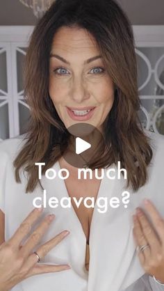 a woman is holding her hands up with the words too much cleavage?