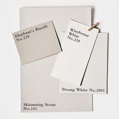 three white cards with black writing on them