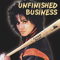 a woman holding a baseball bat with the words unfinished business on it