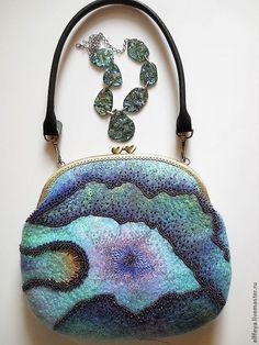 a purse is shown with some beads on it