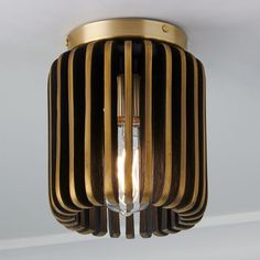 a close up of a light fixture on a ceiling