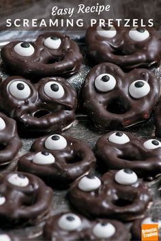 chocolate covered pretzels with googly eyes on them are ready to be eaten