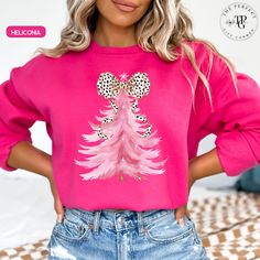 Get festive with our Dalmatian Bow Pink Christmas Tree Sweatshirt for women, featuring a coquette style perfect for the holiday season! This adorable and trendy design combines the charm of a pink Christmas tree with a playful Dalmatian bow, adding a touch of feminine flair to your winter wardrobe. Cozy, cute, and stylish, it's the perfect choice for anyone who loves to celebrate Christmas in a unique and fashionable way! Available also in Tshirt 👉🏻 KEY PRODUCT UNISEX SWEATSHIRT: GILDAN 18000 .: Medium-heavy fabric. .: Loose fit .: Sewn-in label .: Runs true to size, remember to go up 2 sizes than your regular to get the oversize effect!! SIZING CHART UNISEX Adult S, S, M, L, XL, XXL and 3XL are available Remember to go up 2 sizes than your regular to get the oversize effect!! CARE DIREC Christmas Sorority, Pink Christmas Sweater, Family Sweaters, Family Sweater, Xmas Sweaters, A Pink Christmas, Coquette Christmas, Pink Tree, Coquette Style