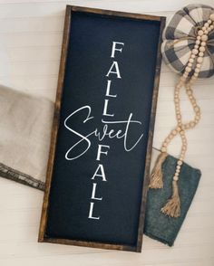 a chalkboard with the words fall sweet steal written on it next to other items