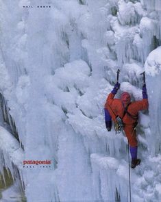 a man climbing up the side of a snow covered mountain with ice on it's sides