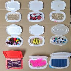 there are many plastic containers with different things in them