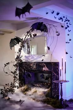 a living room decorated for halloween with bats