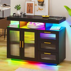 Product Description: LED liquor cabinet designed with auto sensor function, which will up and off automatically when you approach. This TV console table has a smart control panel on the table top, which has 3 charging methods(Wireless/USB/Type C charging), and the 24 color light can be also changed easily with the panel Feature: Built-in LED Light Strip Our LED light strip is already built into the kitchen cabinets, you don't need to install by yourself 24 Different Modes of Lighting: Offers 7 d White Buffet Table, Dinning Room Bar, Black Sideboard Buffet, Modern Bar Cabinet, Modern Kitchen Storage, Smart Panel, White Buffet, Large Storage Cabinets, Tv Console Table