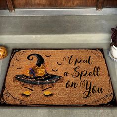 a door mat that says, i put a spell on you