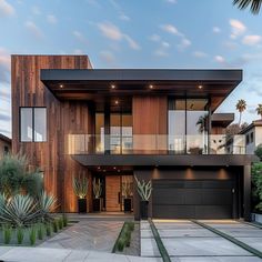 a modern house with wood siding and glass windows