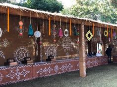 a long table with decorations hanging from it's sides