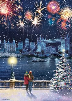 two people standing next to each other near a christmas tree with fireworks in the sky