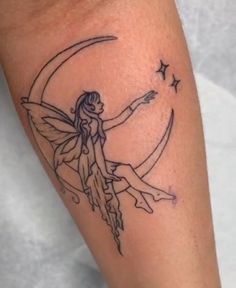 a small fairy sitting on the moon with stars around her arm and holding a wand